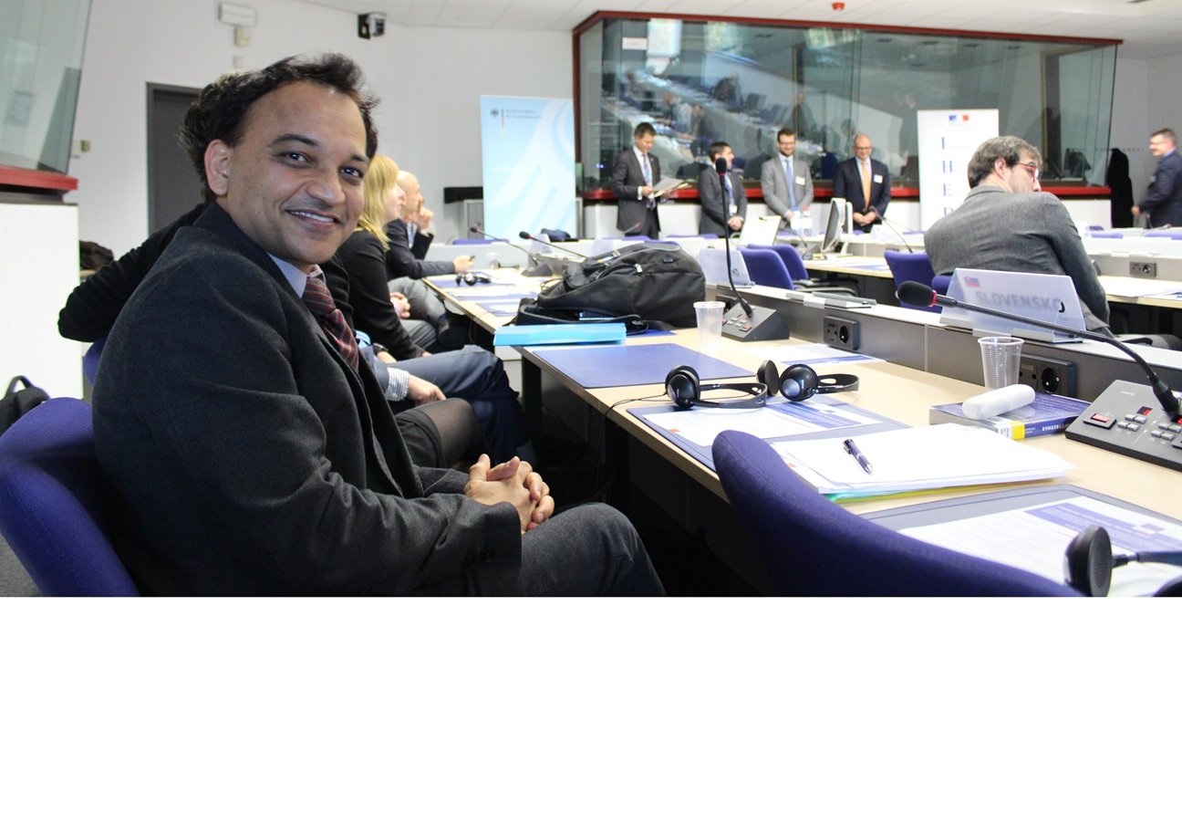 Paresh Rathod moderating an international AI symposium panel